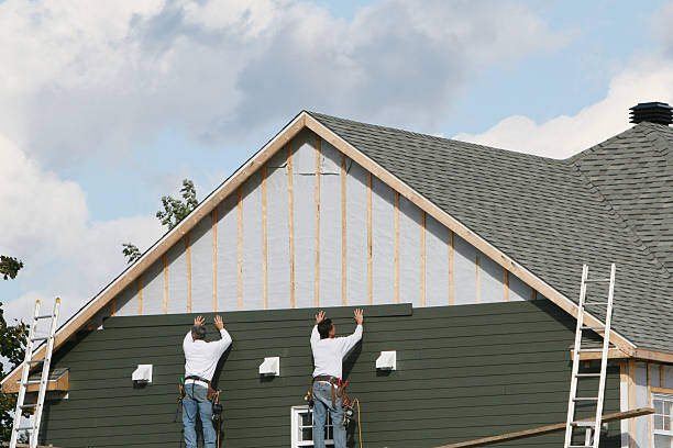 Professional Emergency Siding Repair technician working in Decatur, IN